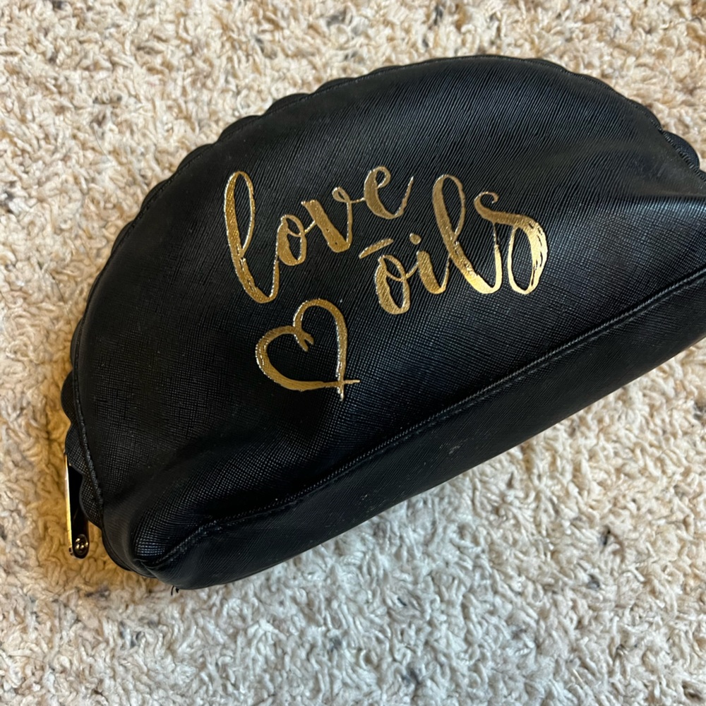 Doterra black and gold makeup/oil pouch